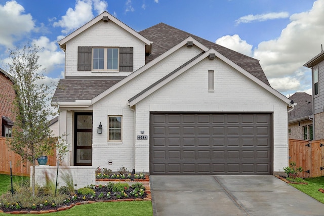 20923 Grand Surprise Ct, Cypress, TX 77433 - traditional home featuring roof with shingles, fence, driveway, and a garage