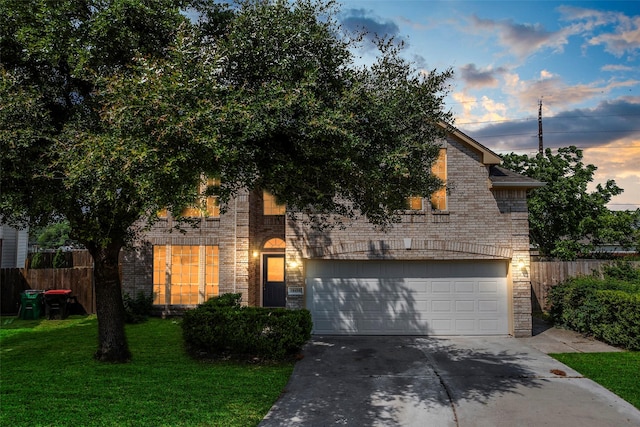 18438 Brenwood Manor Dr, Katy, TX 77449 - view of front facade featuring concrete driveway, a garage, and brick siding