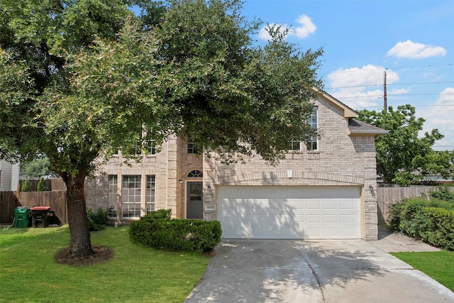 18438 Brenwood Manor Dr, Katy, TX 77449 - view of front facade with driveway, an attached garage, and brick siding