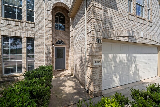 18438 Brenwood Manor Dr, Katy, TX 77449 - view of exterior entry featuring a garage