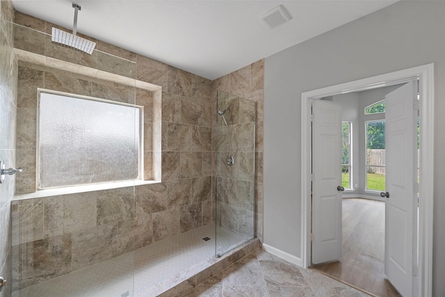 18438 Brenwood Manor Dr, Katy, TX 77449 - full bathroom with tiled shower and baseboards