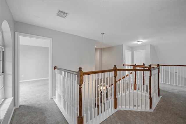 18438 Brenwood Manor Dr, Katy, TX 77449 - hall with an upstairs landing, carpet, and baseboards