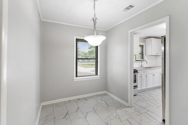 1202 13th St N, Texas City, TX 77590 - unfurnished room with light marble finish flooring, a sink, crown molding, and baseboards