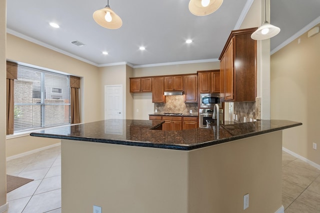 16506 Shimmering Lake Dr, Cypress, TX 77433 - kitchen with light tile patterned flooring, stainless steel appliances, under cabinet range hood, decorative backsplash, and crown molding