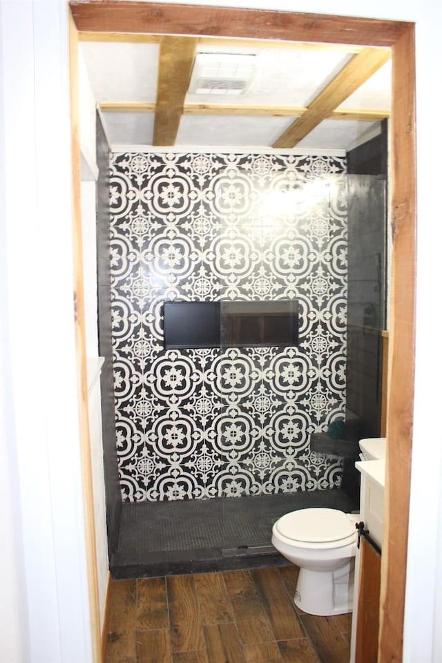 1314 Hooks St, Crockett, TX 75835 - bathroom featuring toilet, wood finished floors, and vanity