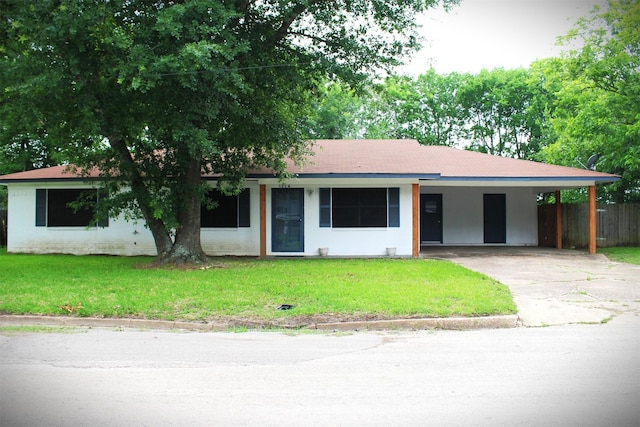 1314 Hooks St, Crockett, TX 75835 - view of front of house featuring concrete driveway, an attached carport, and roof with shingles