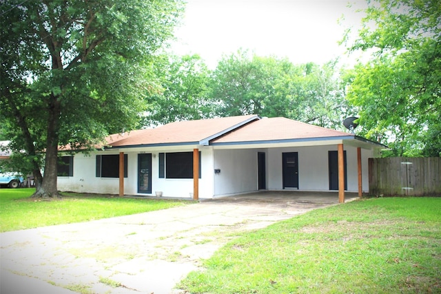 1314 Hooks St, Crockett, TX 75835 - single story home featuring concrete driveway and an attached carport