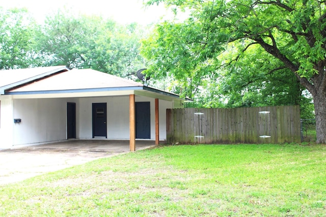 1314 Hooks St, Crockett, TX 75835 - view of front of home with concrete driveway and a carport