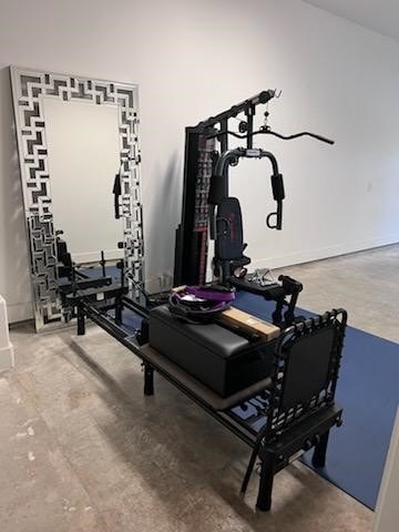 10630 Hazel Hills Dr, Cypress, TX 77433 - exercise room featuring baseboards