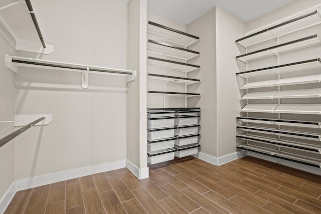 10630 Hazel Hills Dr, Cypress, TX 77433 - walk in closet with wood finish floors