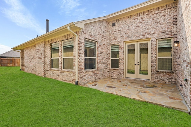 10630 Hazel Hills Dr, Cypress, TX 77433 - rear view of property featuring brick siding, a patio, and french doors