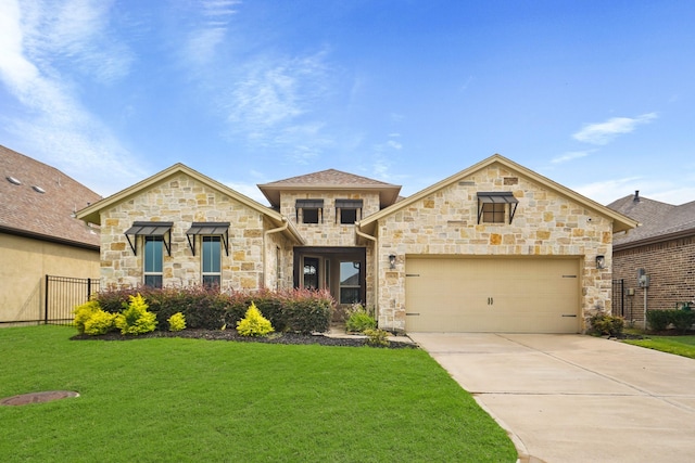 10630 Hazel Hills Dr, Cypress, TX 77433 - view of front of house with stone siding, driveway, and an attached garage