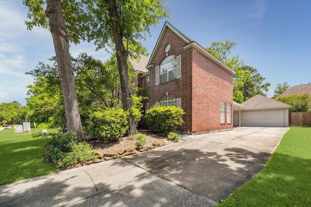 view of home's exterior featuring brick siding and a yard