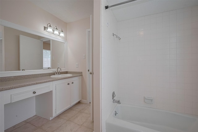 bathroom with tile patterned flooring,  shower combination, and vanity