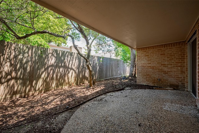 view of patio with fence
