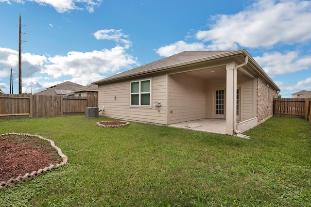 9526 Opal Gates Dr, Rosharon, TX 77583 - back of property with a patio and central air condition unit