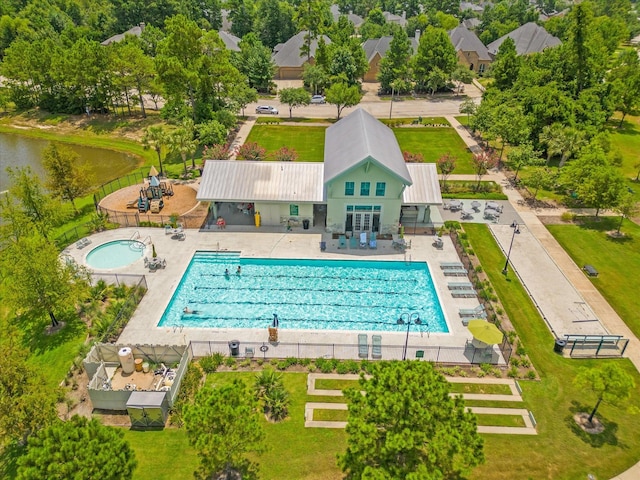 10442 Lake Palmetto Dr, Conroe, TX 77385 - aerial view of property and surrounding area featuring a pool area