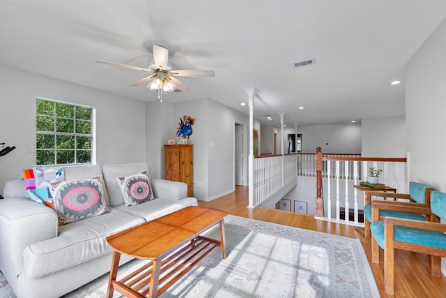 4510 Hazelton St, Houston, TX 77035 - living area featuring wood finished floors, ceiling fan, recessed lighting, and baseboards