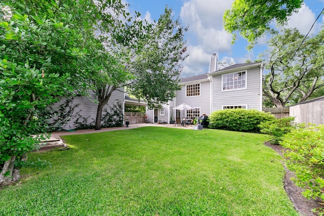 4510 Hazelton St, Houston, TX 77035 - back of house with a chimney and a patio area