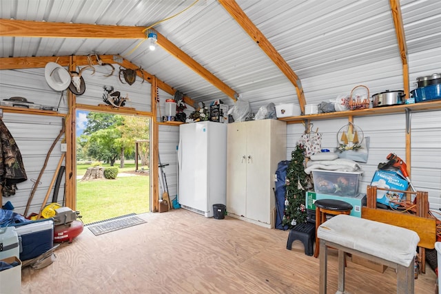 19769 State Highway 21 E, Grapeland, TX 75844 - garage with freestanding refrigerator
