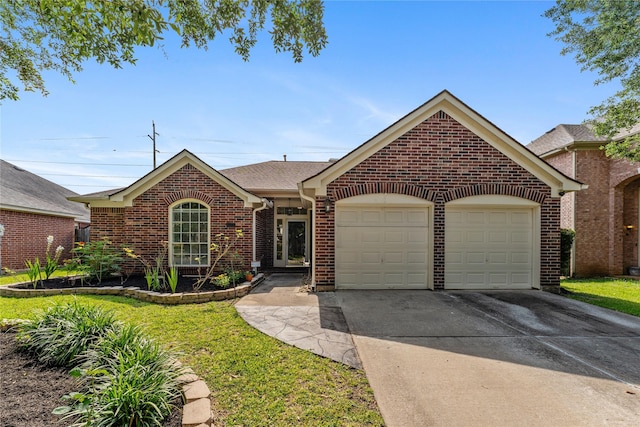 3418 Mcmahon Way, Missouri City, TX 77459 - view of front of house featuring a garage, concrete driveway, brick siding, and a front lawn