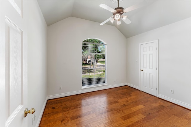 3418 Mcmahon Way, Missouri City, TX 77459 - spare room featuring wood finished floors, vaulted ceiling, a ceiling fan, and baseboards