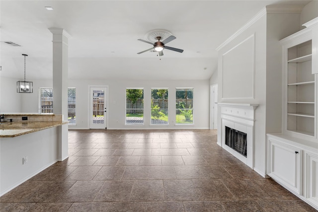 3418 Mcmahon Way, Missouri City, TX 77459 - unfurnished living room featuring a fireplace, ceiling fan, built in shelves, and baseboards