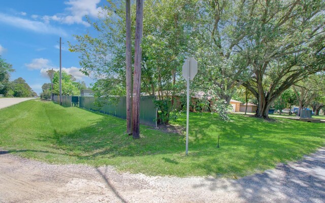 12211 3rd St, Santa Fe, TX 77510 - view of yard with fence