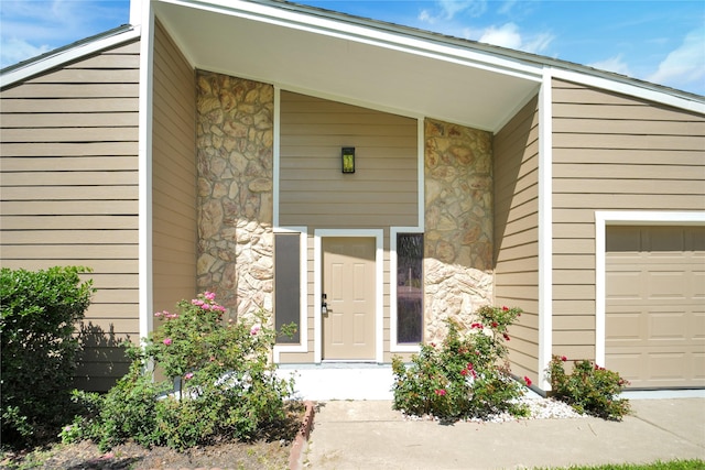 964 Lake View Dr, Montgomery, TX 77356 - view of exterior entry featuring stone siding