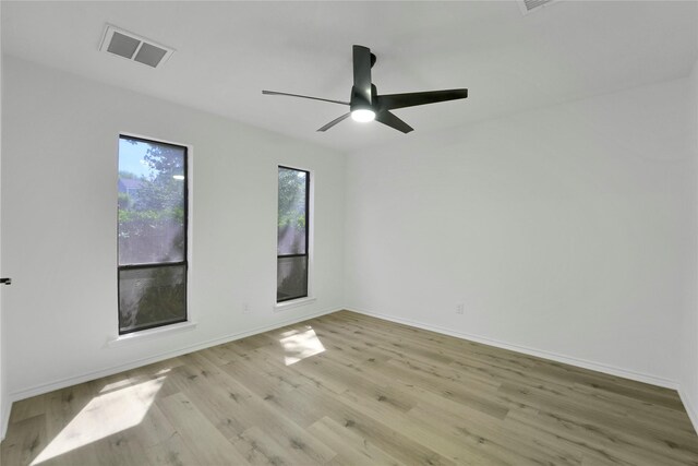 964 Lake View Dr, Montgomery, TX 77356 - empty room featuring wood finished floors, ceiling fan, and baseboards