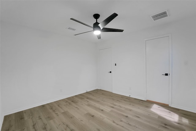 964 Lake View Dr, Montgomery, TX 77356 - unfurnished room with light wood finished floors, a ceiling fan, and baseboards