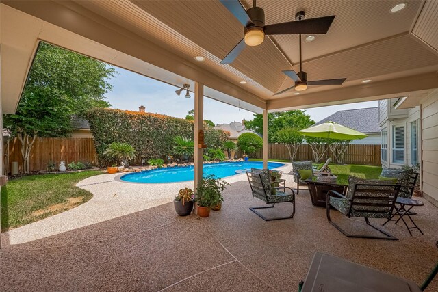 5807 Juniper Knoll Ln, Houston, TX 77345 - view of swimming pool featuring a patio area, a fenced backyard, and ceiling fan