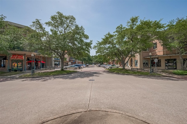 5807 Juniper Knoll Ln, Houston, TX 77345 - view of asphalt street with curbs and sidewalks