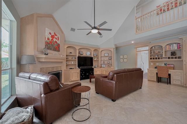5807 Juniper Knoll Ln, Houston, TX 77345 - living area with lofted ceiling, a fireplace, ceiling fan, built in features, and light tile patterned flooring