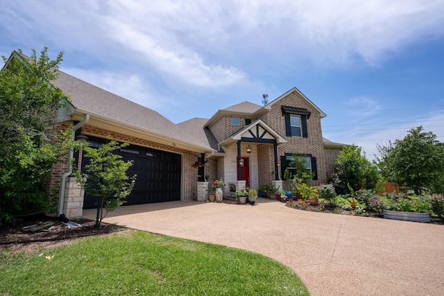 18084 Morning Dove Cir, College Station, TX 77845 - view of front of property featuring concrete driveway, brick siding, an attached garage, and a shingled roof