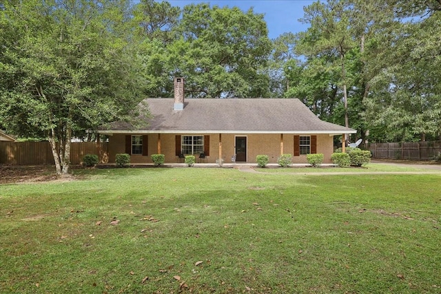 102 Jane Ln, Silsbee, TX 77656 - view of front of property with a chimney