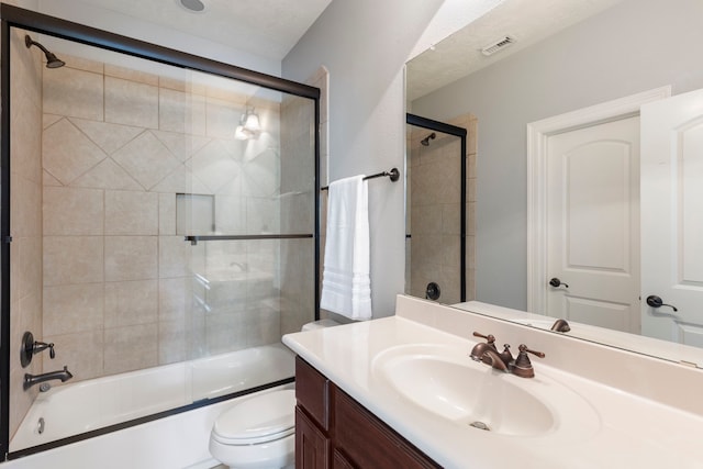 15557 Crown Oaks Dr, Montgomery, TX 77316 - bathroom with vanity, toilet, and bath / shower combo with glass door