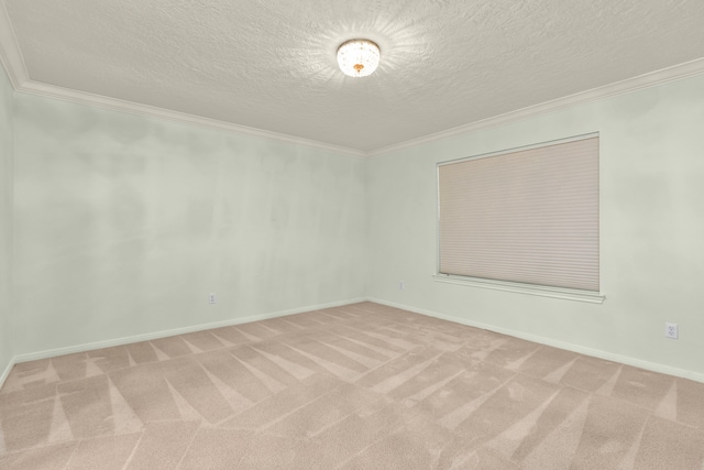1022 Oak Leaf St, La Porte, TX 77571 - carpeted empty room featuring a textured ceiling, ornamental molding, and baseboards