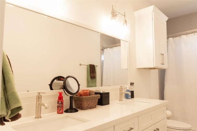 29 Cmdr Runco Ln, Taylor Lake Village, TX 77586 - full bathroom featuring double vanity, toilet, and a shower with shower curtain