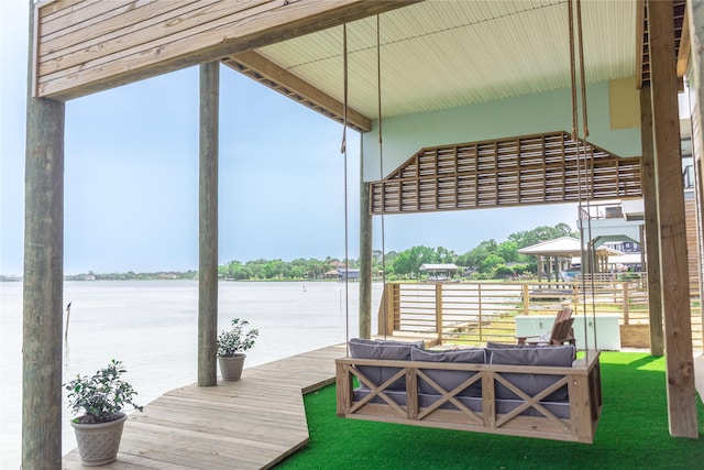 29 Cmdr Runco Ln, Taylor Lake Village, TX 77586 - dock with a water view and an outdoor hangout area