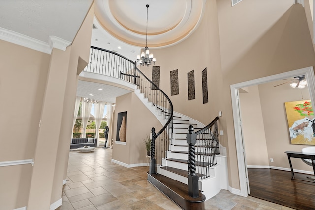 12011 Charlottes Bequest Cir, Cypress, TX 77433 - entrance foyer with a high ceiling, ornamental molding, stairs, baseboards, and a ceiling fan