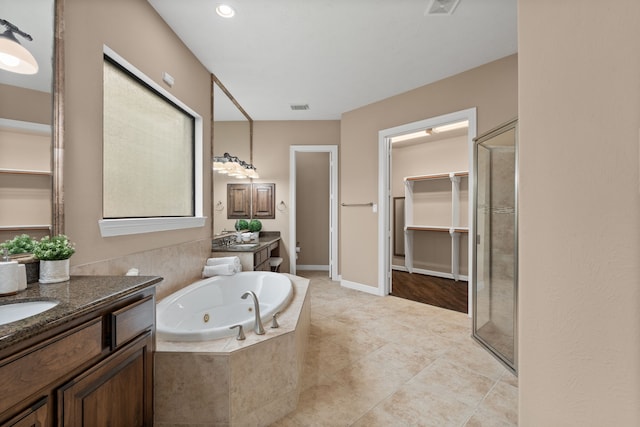 12011 Charlottes Bequest Cir, Cypress, TX 77433 - bathroom with a stall shower, a tub with jets, two vanities, and a spacious closet