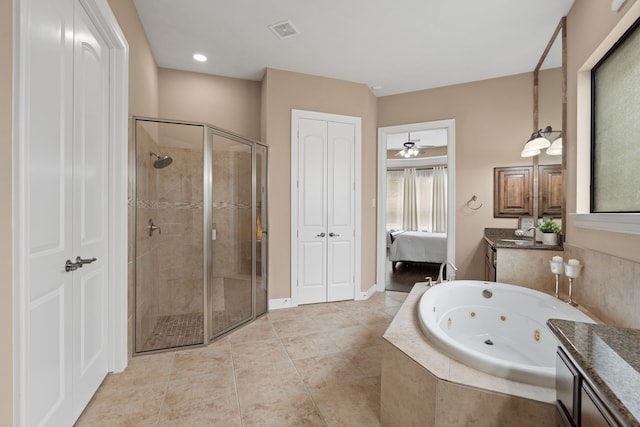 12011 Charlottes Bequest Cir, Cypress, TX 77433 - full bath featuring a shower stall, a tub with jets, vanity, and tile patterned flooring
