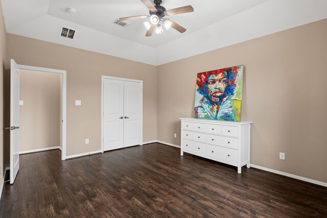 12011 Charlottes Bequest Cir, Cypress, TX 77433 - unfurnished bedroom featuring dark wood-style floors, baseboards, a ceiling fan, and a closet