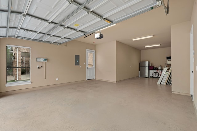 12011 Charlottes Bequest Cir, Cypress, TX 77433 - garage featuring freestanding refrigerator, a garage door opener, and electric panel