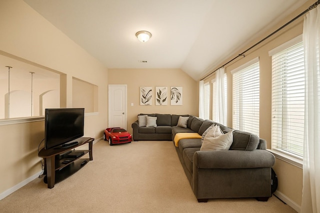 31550 Elkcreek Bend Dr, Hockley, TX 77447 - living area with carpet floors, plenty of natural light, and vaulted ceiling