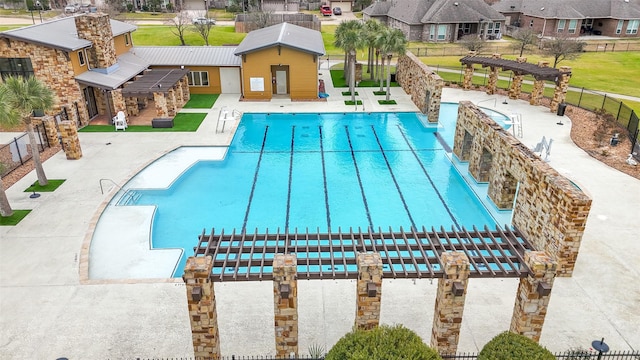 31550 Elkcreek Bend Dr, Hockley, TX 77447 - community pool featuring a pergola, a patio, and a residential view