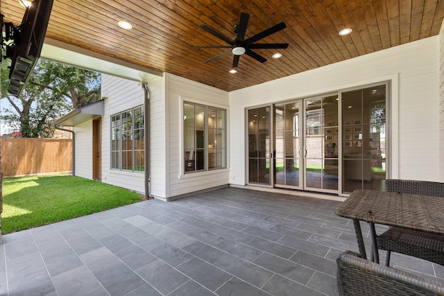 view of patio / terrace featuring a ceiling fan and fence