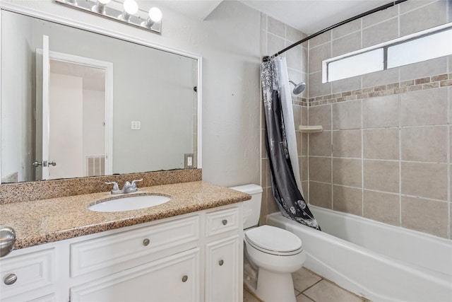 15623 Ensenada Dr, Houston, TX 77083 - bathroom featuring shower / tub combo with curtain, toilet, vanity, and tile patterned flooring