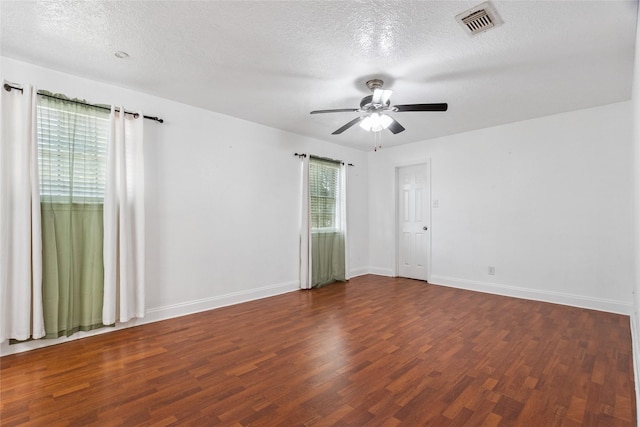 15623 Ensenada Dr, Houston, TX 77083 - spare room with wood finished floors, ceiling fan, a textured ceiling, and baseboards